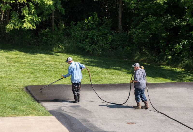 Local Driveway Sealcoating pros at work